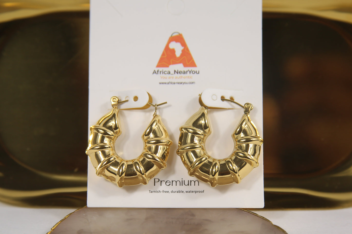 Premium Gold Twisted Hoop Earrings.