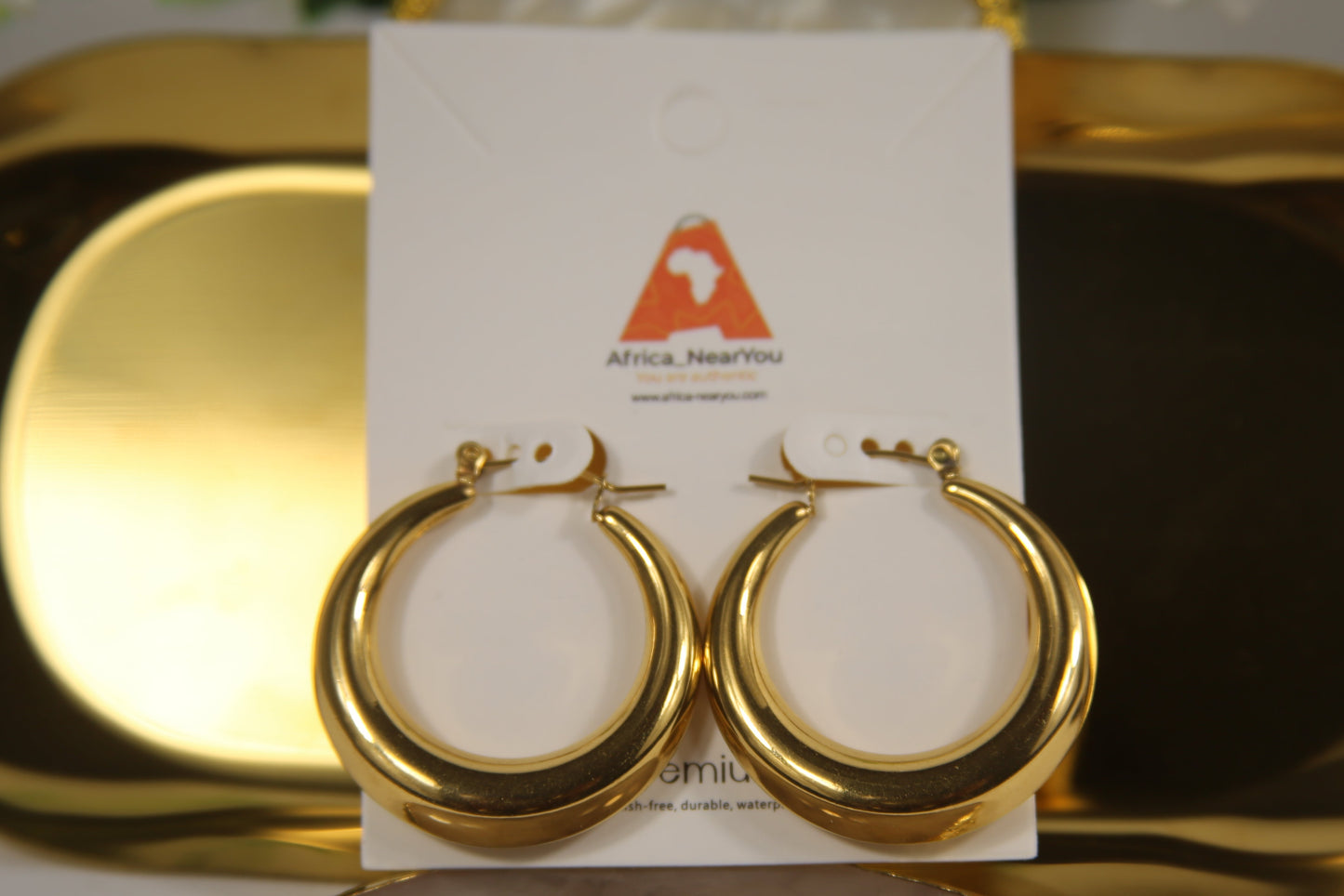 Premium Gold Twisted Hoop Earrings.