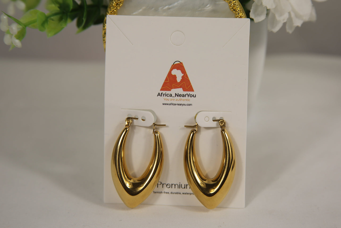 Premium Gold Twisted Hoop Earrings.