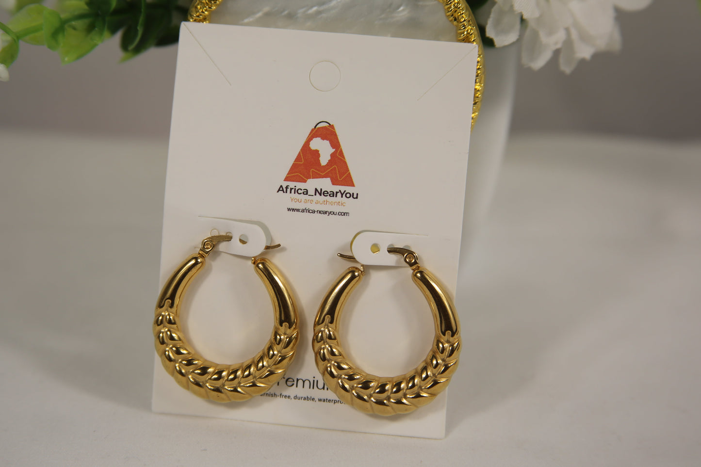 Premium Gold Twisted Hoop Earrings.